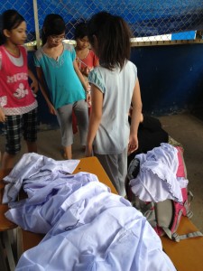 Distribution new school uniforms for children of House #3 & 4